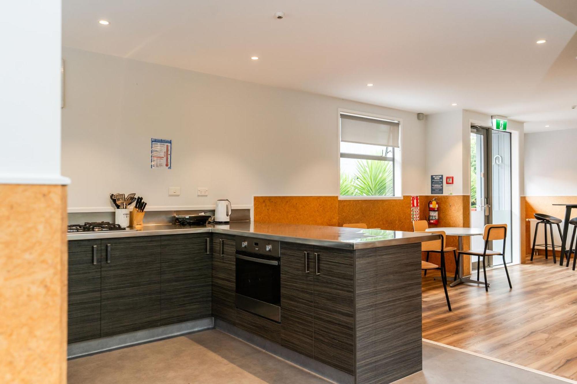 Haka House Rotorua Hostel Bagian luar foto The kitchen in the dining room